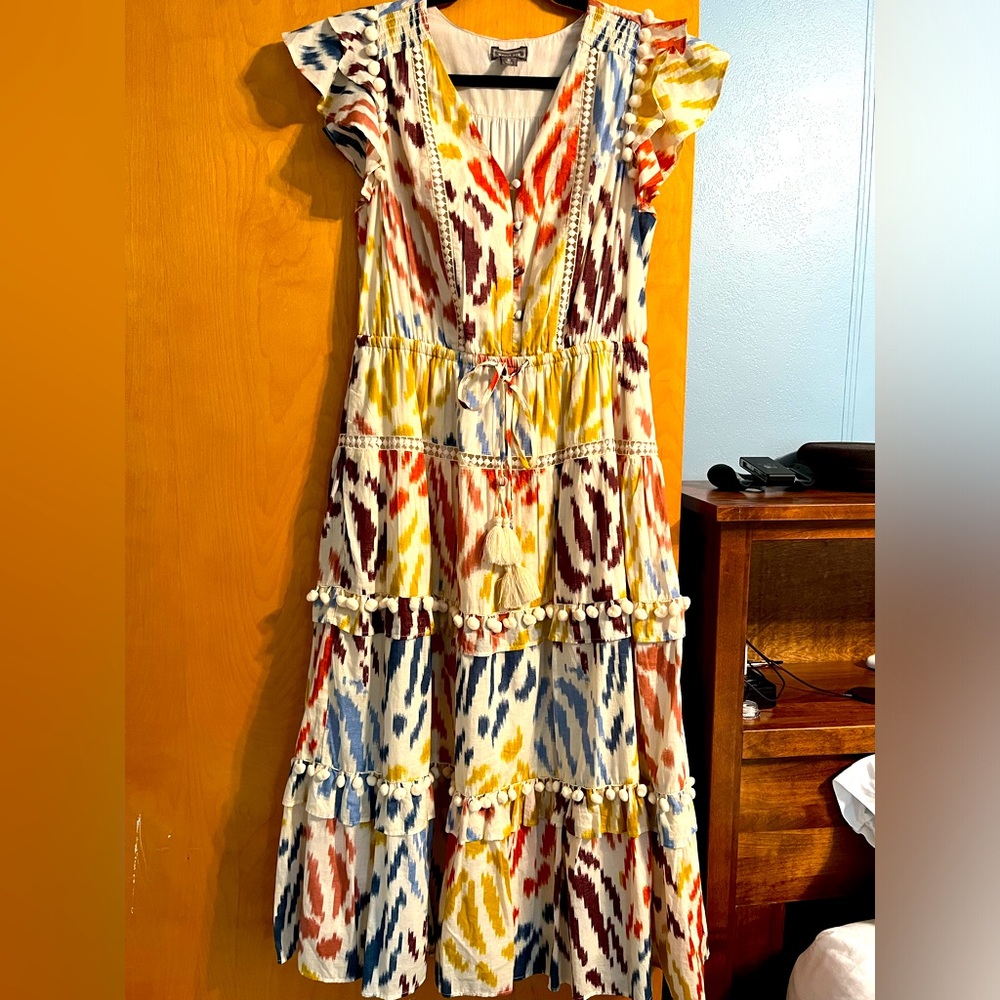 I love love this dress, given to me by a client! It is just a little long for me